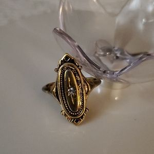 70s Avon Kensington North South goldtone ring.